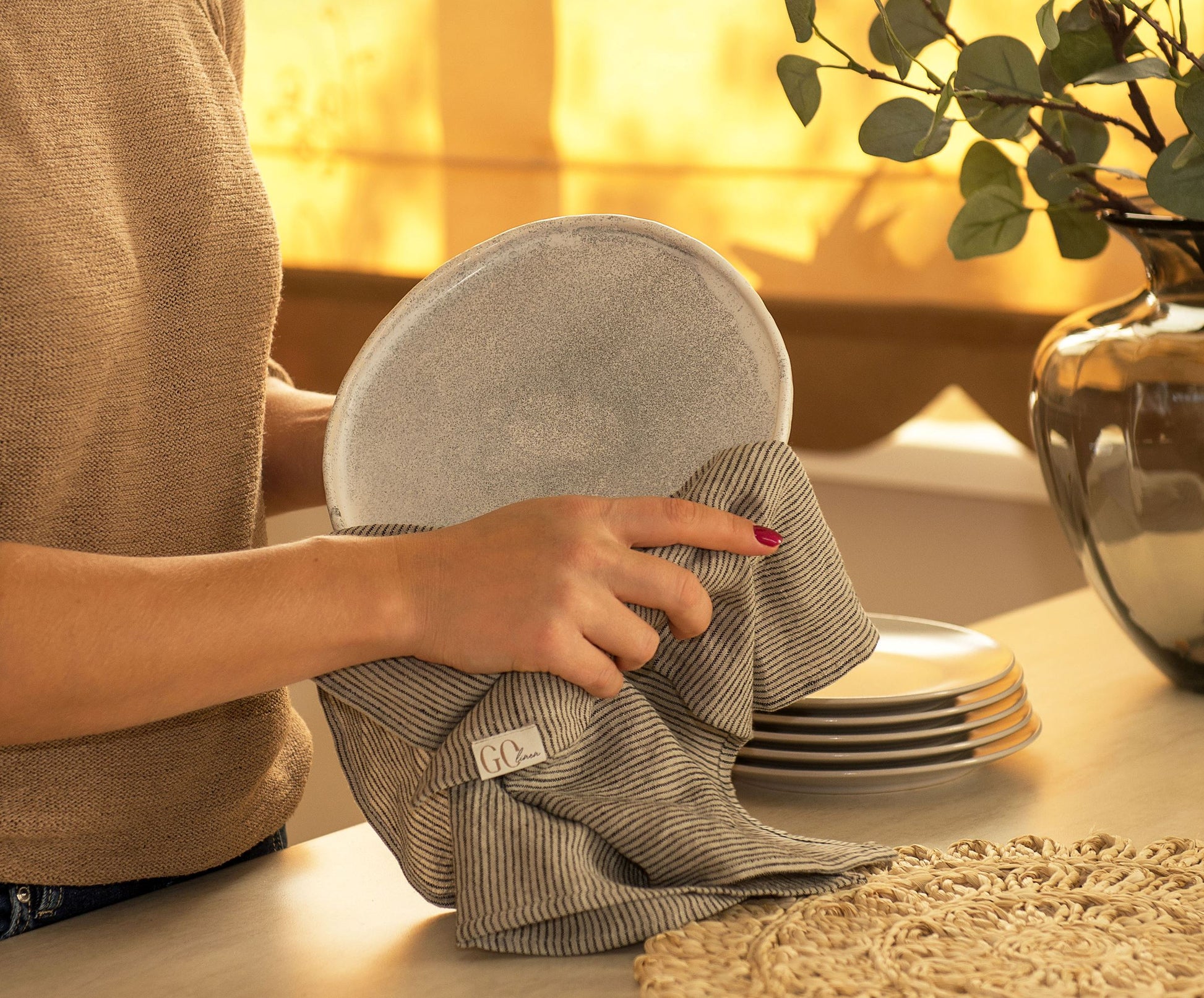 grey striped kitchen towel with hanging loop