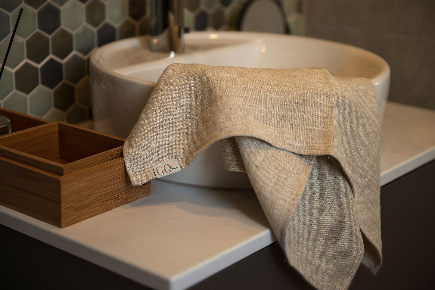 linen bath towels set, hangingon the sink