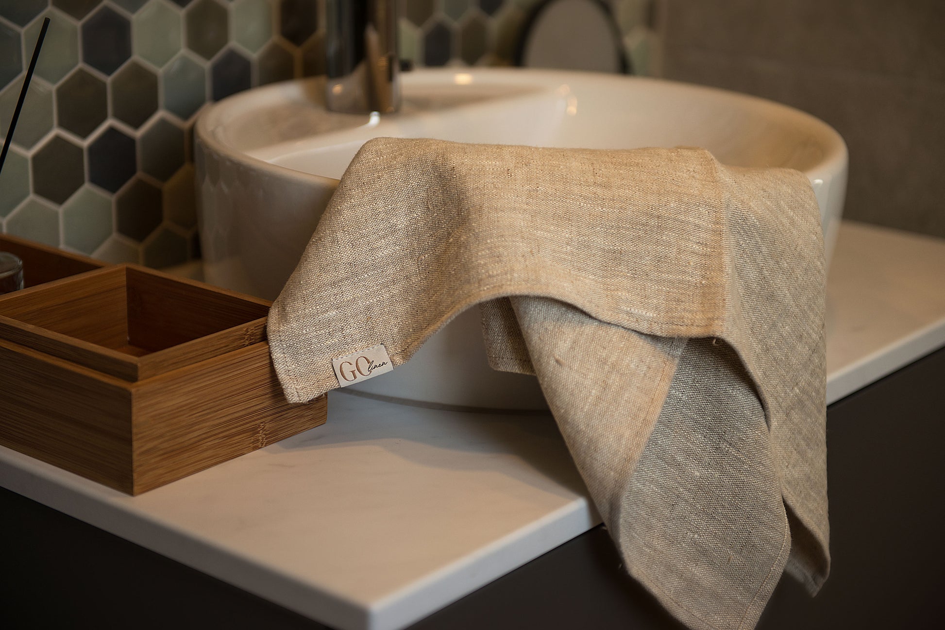 Melange linen hand towel on the sink